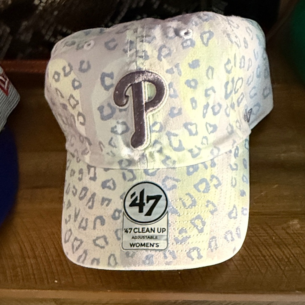 47  woman’s Phillies hat with Purple and White Leopard Design